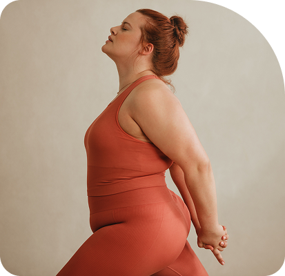 plus size woman doing yoga