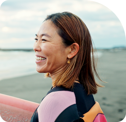 Middle Aged Woman with surfboard